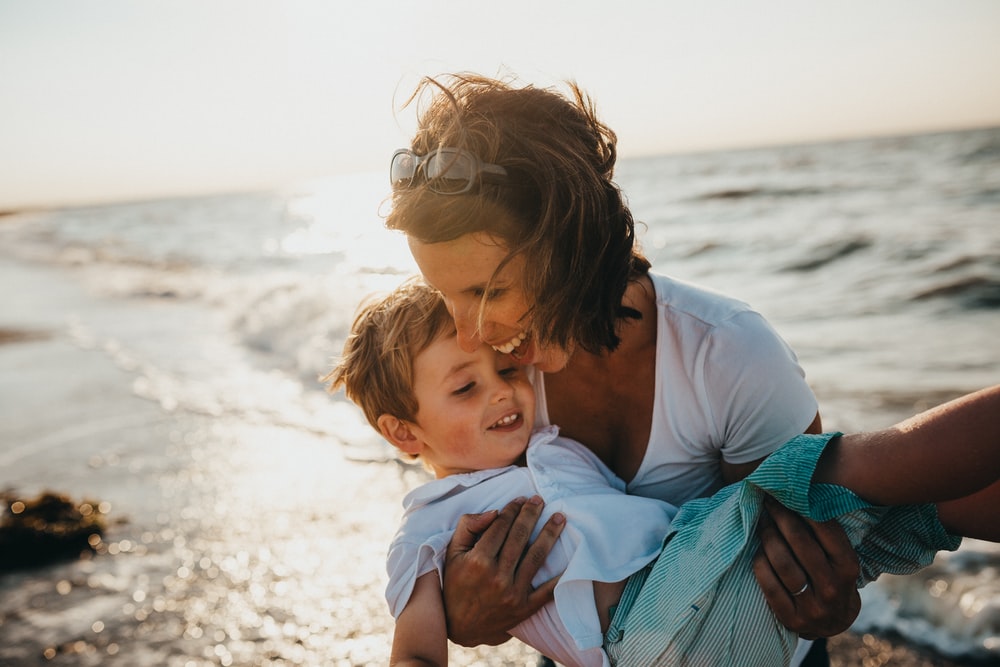 keeping fit while playing with child 