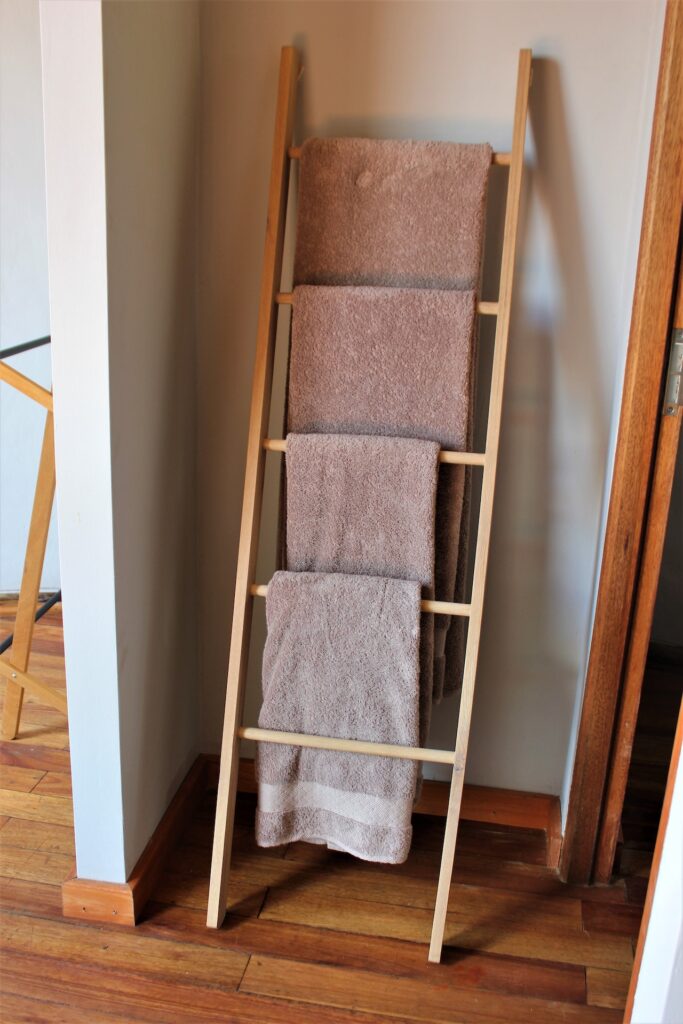 Photo by Roger Brown: https://www.pexels.com/photo/towels-drying-on-rack-5630428/